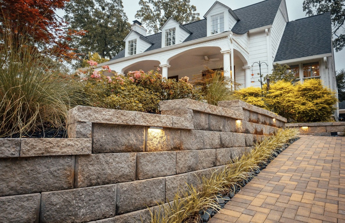 Custom natural stone retaining wall and paver driveway installation in Vallejo, CA